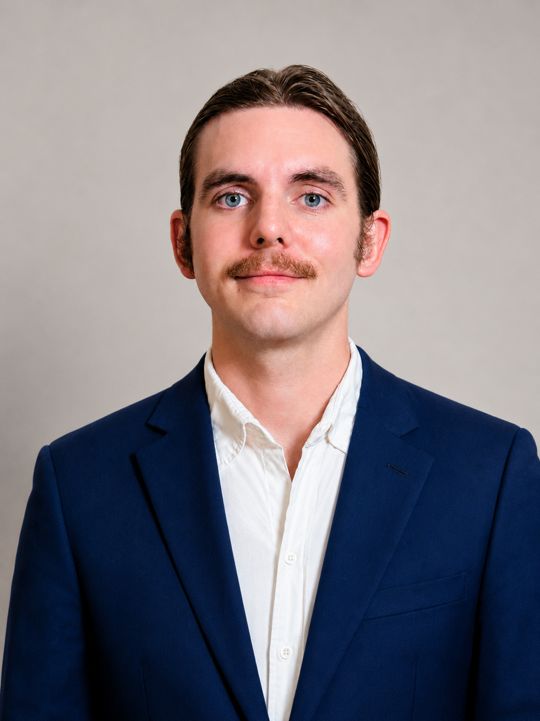 Professional headshot of Samuel Webster